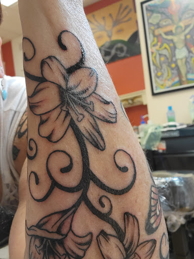 Explore royal tattoo ideas, creative tattoo ideas in Ann Arbor, available at Name Brand Tattoo