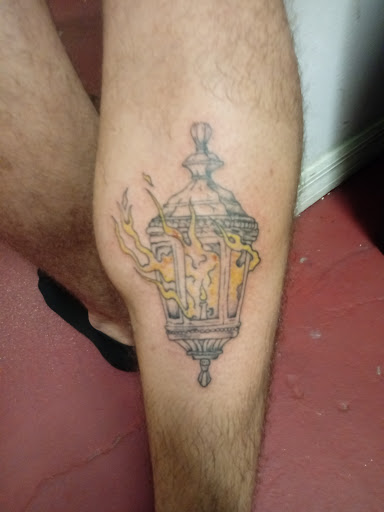 Explore small ear tattoo ideas, creative tattoo ideas in New Orleans, available at Catahoula Tattoo 