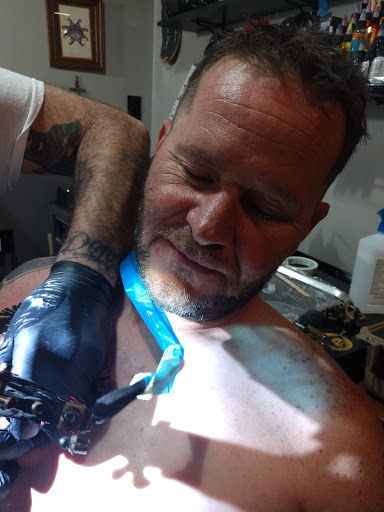 Explore mom & son tattoo ideas, creative tattoo ideas in Webster, available at Mainline Ink