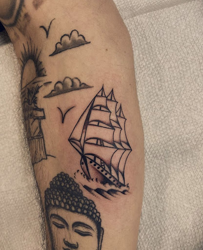 Explore black king tattoo ideas, creative tattoo ideas in Glenside, available at Iron Will Tattoo Club
