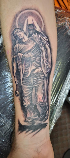 Find top of shoulder tattoo ideas for your next unique tattoo in Angola at Hoodlum Ink