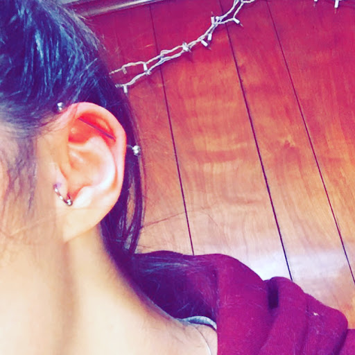Explore matching tattoo ideas for husband and wife, creative tattoo ideas in Lewiston, available at Professional Piercers of Maine