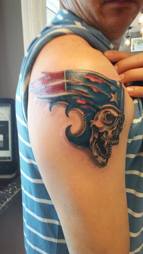 Explore red ink tattoo ideas, creative tattoo ideas in Myrtle Beach, available at Myrtle Beach Ink