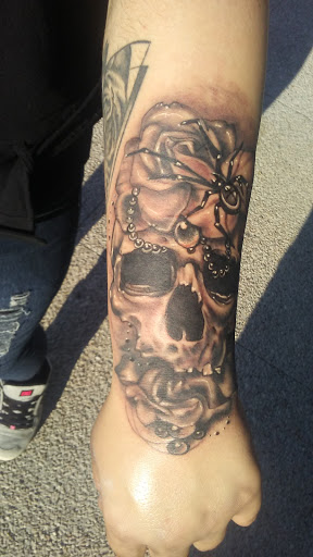 Explore cattle brand tattoo ideas, creative tattoo ideas in Stuart, available at Urban Inkers Tattoos