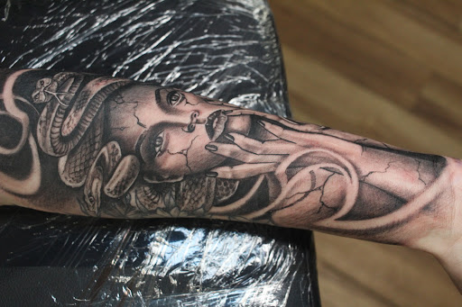 Explore flower shoulder tattoo ideas, creative tattoo ideas in Homosassa, available at Citrus Tattoos