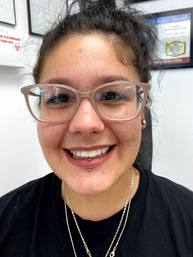 Explore flower wrist tattoo ideas, creative tattoo ideas in Myrtle Beach, available at Professional Body Piercing by Jackie