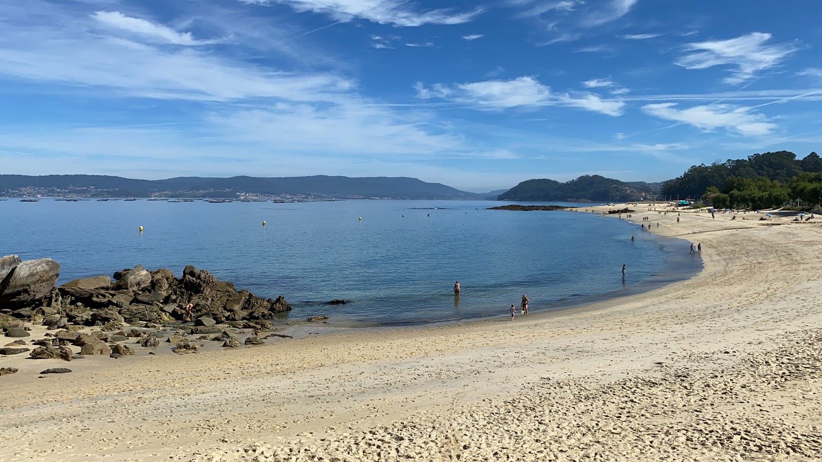 Foto av Praia Agrelo Portomaior med vit fin sand yta