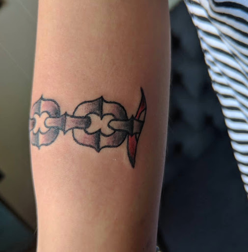Explore breast cancer tattoo ideas, creative tattoo ideas in Lawrence, available at Standard Electric Tattooing