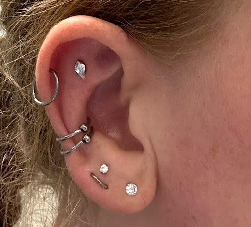Find tattoo ideas with clocks for your next unique tattoo in Scranton at Pat Riot Piercing