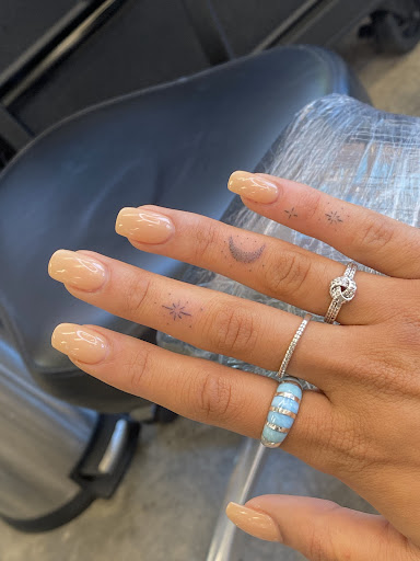 Explore ear tattoo ideas for women, creative tattoo ideas in Duncanville, available at Studio Fourteen Tattoos