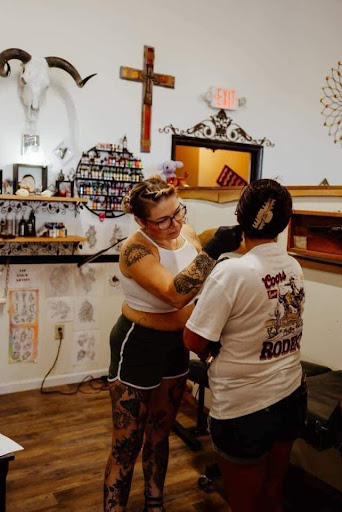 Explore ghost tattoo ideas, creative tattoo ideas in Cornelia, available at Prismatic Pulse Tattoo