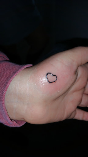 Explore hand tattoo idea, creative tattoo ideas in Centre, available at Ink You Tattoos
