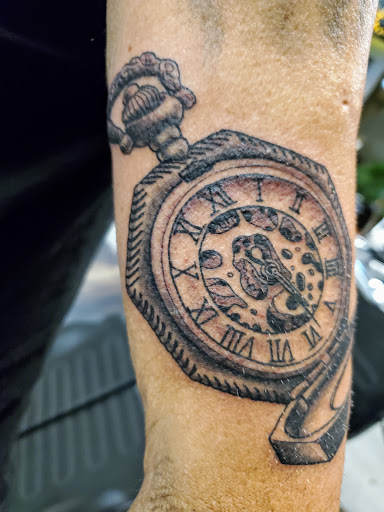 Explore half sleeve memorial tattoo ideas, creative tattoo ideas in Lakeland, available at Holy Grail Tattoo