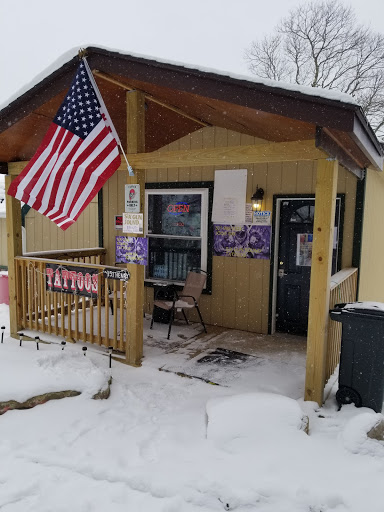 Explore forearm dragon tattoo ideas, creative tattoo ideas in Davis, available at SIX GUN SOUND TATTOO