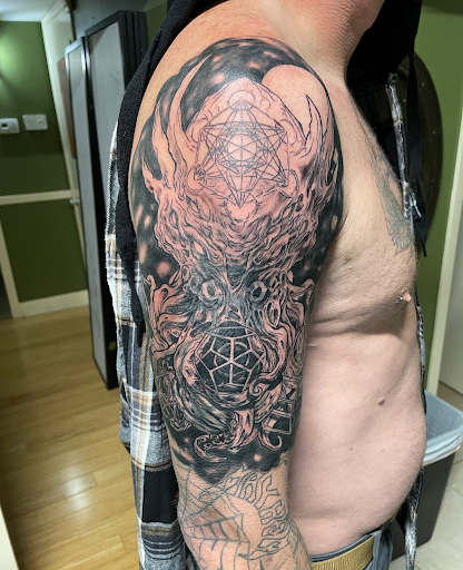 Explore leg tattoo ideas for men, creative tattoo ideas in Saint Petersburg, available at Cthulhu Tattoo & Body Piercing