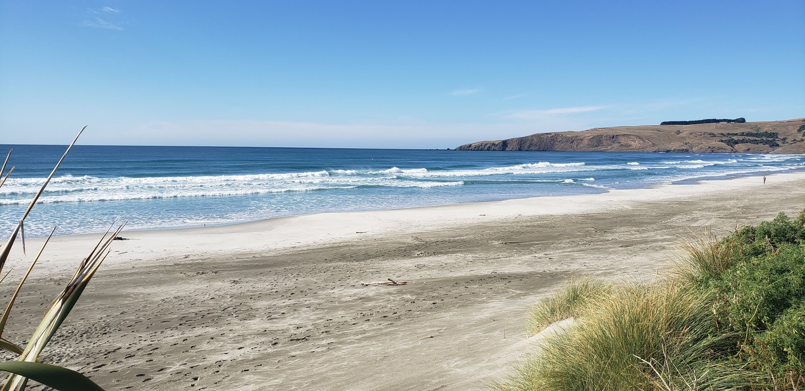Photo de Victory Beach avec rivage droit, long