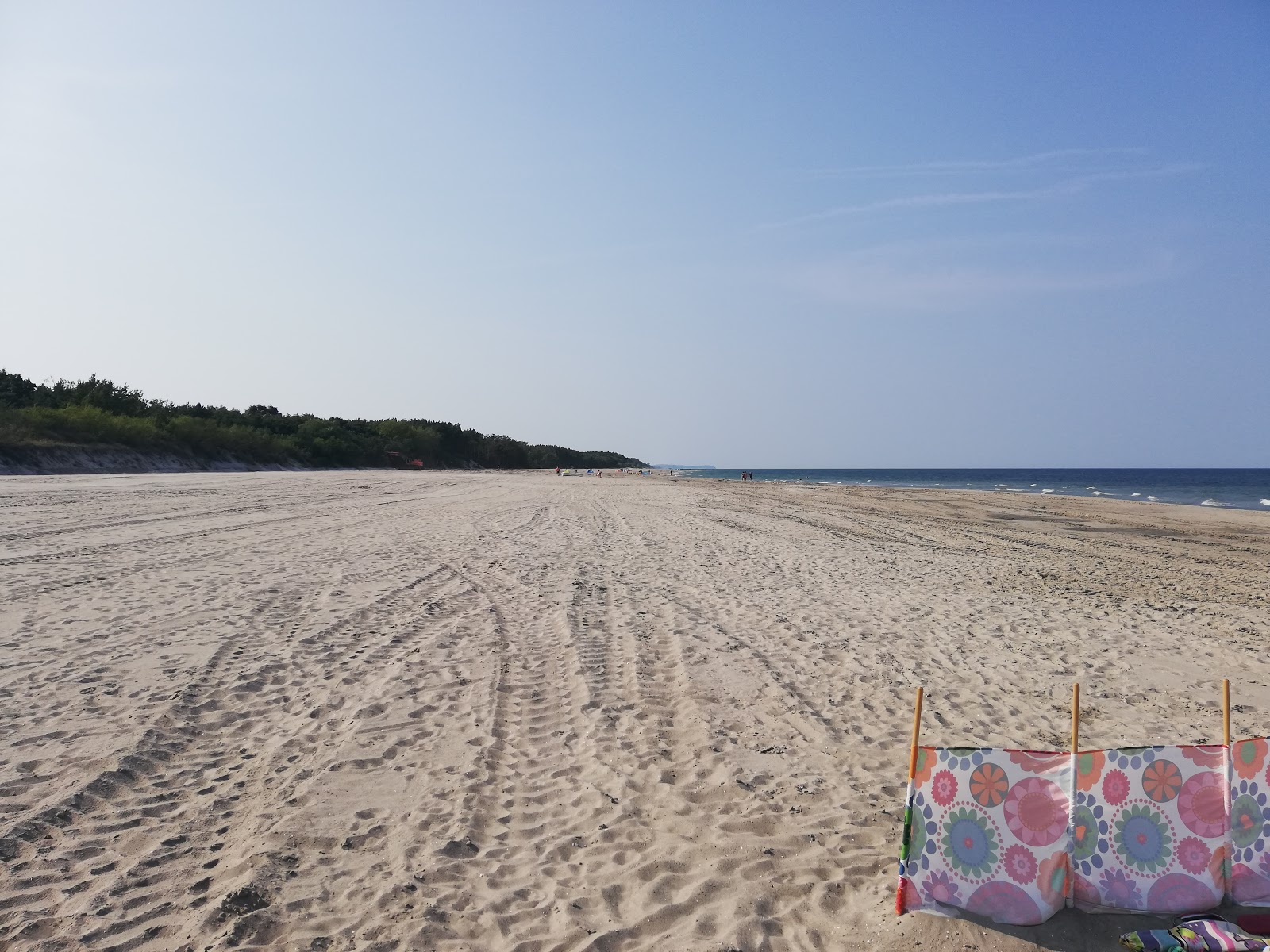 Foto van Kuznica Dog Beach met recht en lang