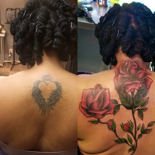 Explore women's lower back tattoo ideas, creative tattoo ideas in Albany, available at Tat Jones Ruthless Tattoos L.L.C.