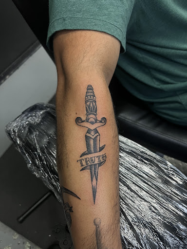 Explore music lover tattoo ideas, creative tattoo ideas in Mcallen, available at House of Tattoos