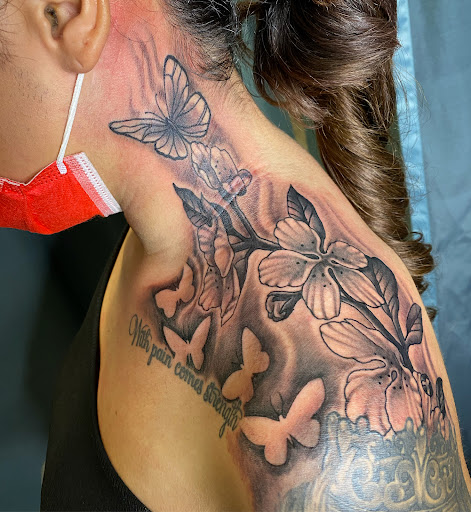 Find christmas tattoo ideas for your next unique tattoo in Passaic at District 36 Tattoo Parlor