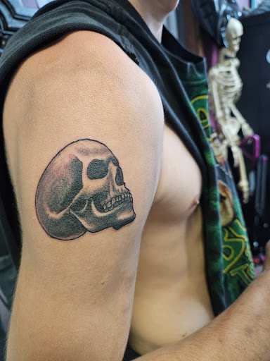 Explore cartoon character tattoo ideas, creative tattoo ideas in Angola, available at Hoodlum Ink