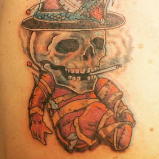 Explore sun tattoo ideas for guys, creative tattoo ideas in New Orleans, available at Catahoula Tattoo 