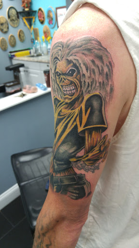 Find tattoo tree ideas for your next unique tattoo in Toms River at Drop N Ink Tattoo Shop