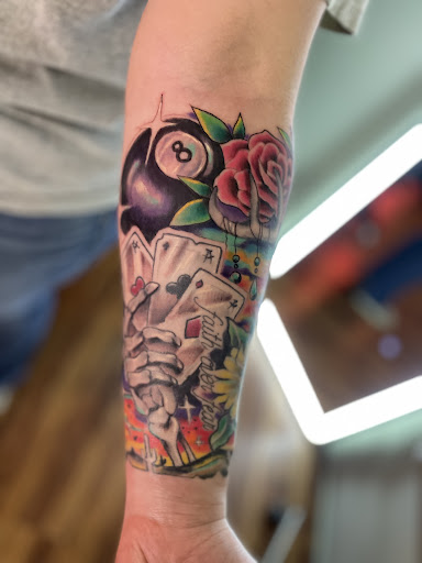 Explore flower tattoo sleeve ideas, creative tattoo ideas in Hayesville, available at Studio 1891 Ink & Art