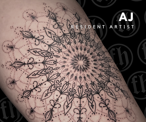 Explore tattoo placement ideas arm female, creative tattoo ideas in Colorado Springs, available at Fallen Heroes Tattoo & Piercing (Colorado)