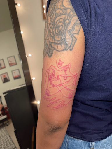 Explore handcuff tattoo ideas, creative tattoo ideas in Phoenix, available at Desert Grace Beauty