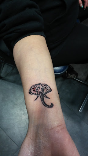 Find palm tattoo ideas for your next unique tattoo in Berkeley at Zebra Body Piercing