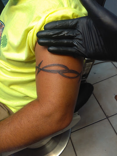 Explore mens small tattoo ideas, creative tattoo ideas in Bradenton, available at Memory Lane Tattoo Co.