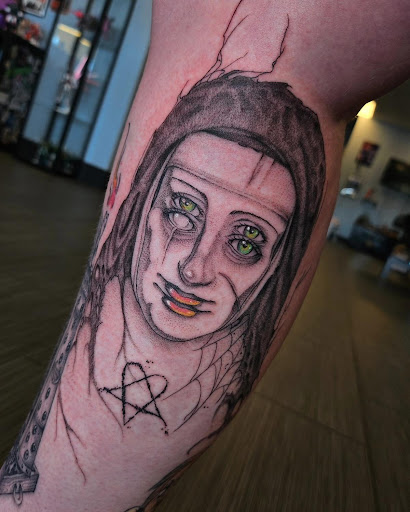 Explore fine line tattoo ideas, creative tattoo ideas in Palm Harbor, available at Angry Owl Tattoo and Piercing
