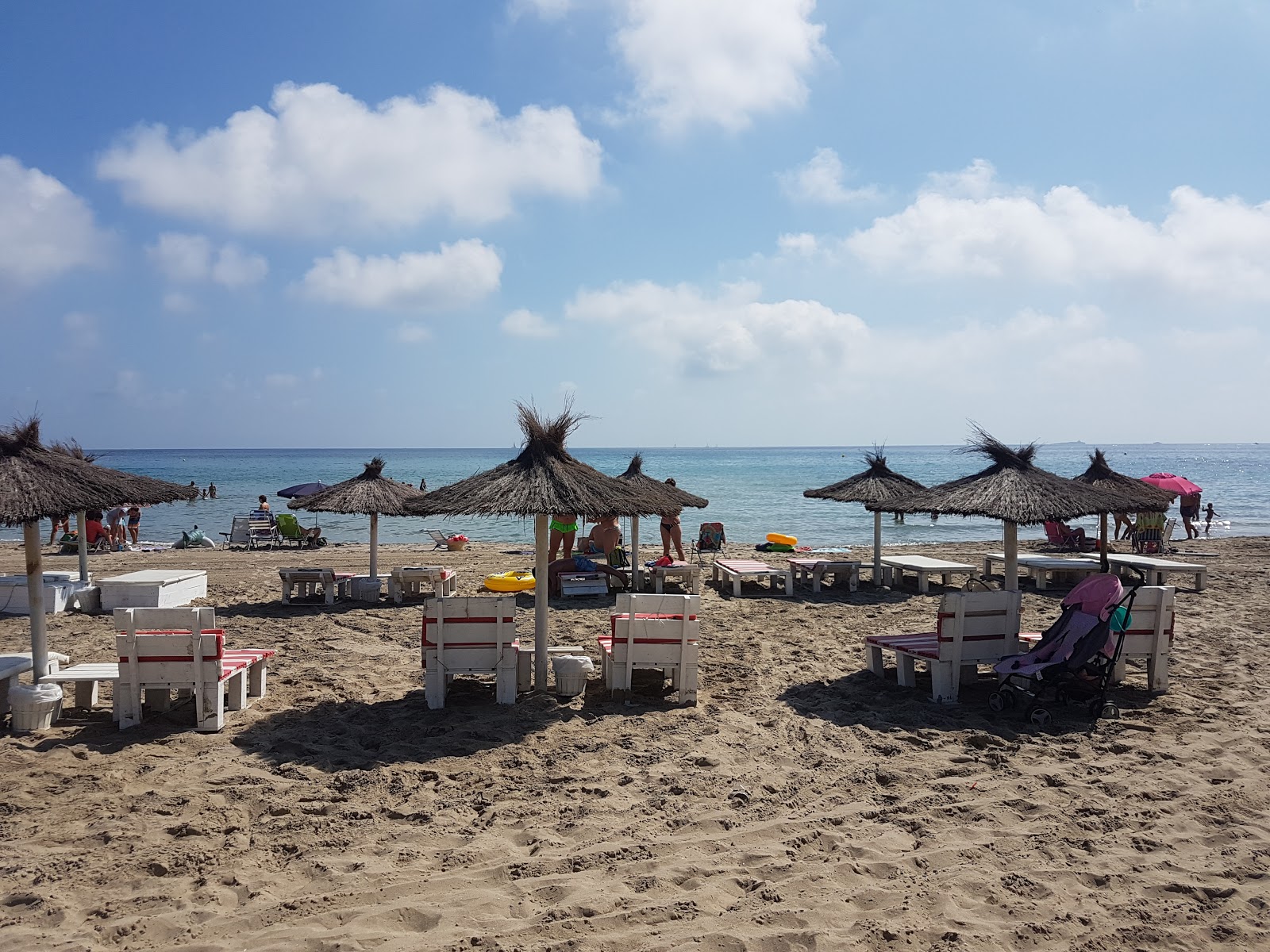 Foto de Playa de Galua e o assentamento