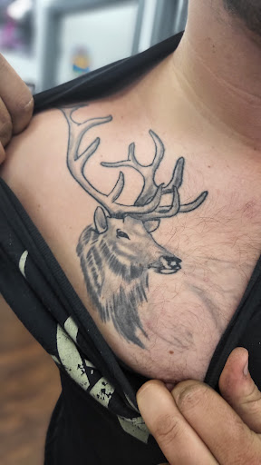 Explore scroll tattoo ideas, creative tattoo ideas in Lewiston, available at Walkins tattoos studio