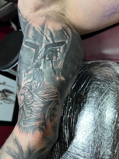 Explore bible verse tattoo ideas for men, creative tattoo ideas in Warner Robins, available at Untold Pain Tattoo Studio