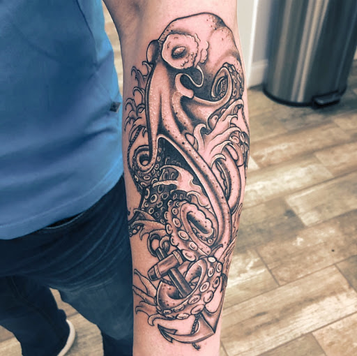 Explore small tattoo ideas with names, creative tattoo ideas in Buford, available at Wild Tribe Tattoos and Piercings