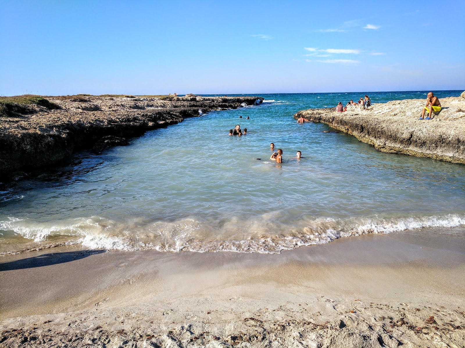 Fotografie cu Spiaggia della Costa Merlata cu o suprafață de nisip beige