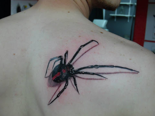 Explore smiley face tattoo ideas, creative tattoo ideas in Rapid City, available at Torch Lake Ink