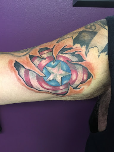 Explore tattoo ideas for pets, creative tattoo ideas in Roscoe, available at Elevated Ink Tattoo