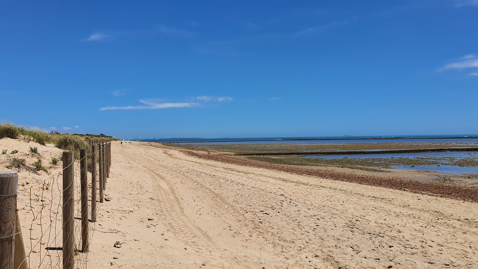 Foto von Rota Strand mit langer gerader strand