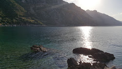 Nisiza Beach'in fotoğrafı düz bir kıyı şeridi ile birlikte