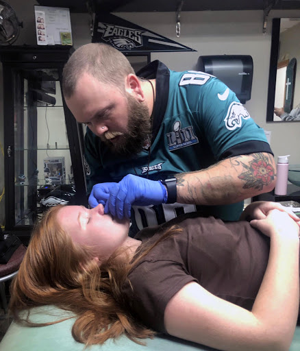 Explore devil may cry tattoo ideas, creative tattoo ideas in Fort Wayne, available at Grade A Tattoos and Body Piercing