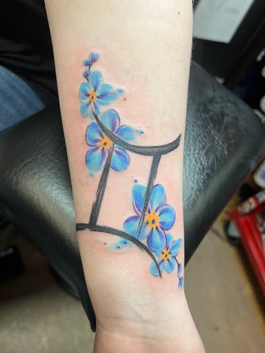 Explore flower tattoo ideas for women, creative tattoo ideas in Hillsboro, available at Chaos Tattoo