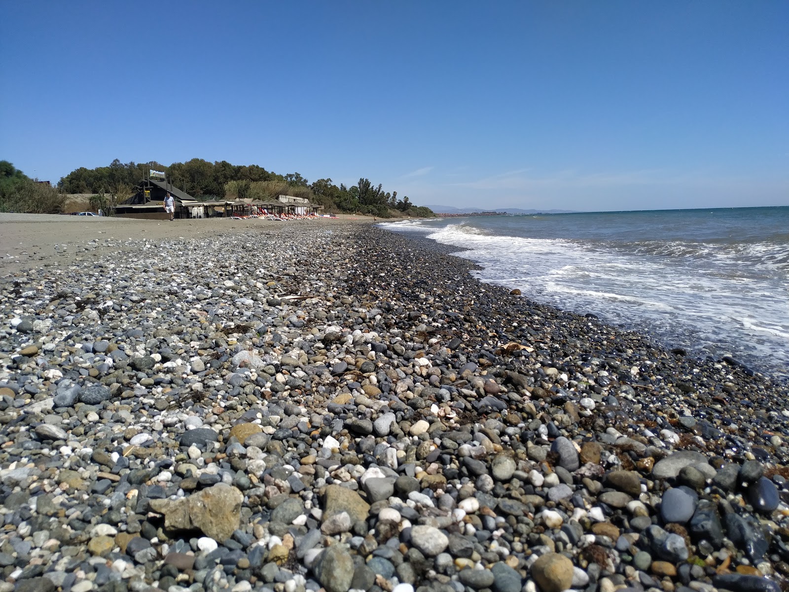 Foto von Playa del Padron und die siedlung