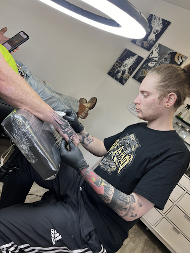 Explore tricep tattoo ideas for men, creative tattoo ideas in Milwaukee, available at Beauty is Pain Tattoo and Body Piercings