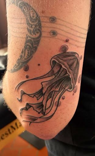 Explore gap filling tattoo ideas, creative tattoo ideas in Deland, available at Untouchable Ink