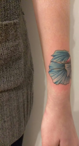 Explore colored tattoo ideas, creative tattoo ideas in Hebron, available at Explosive Ink Tattoo