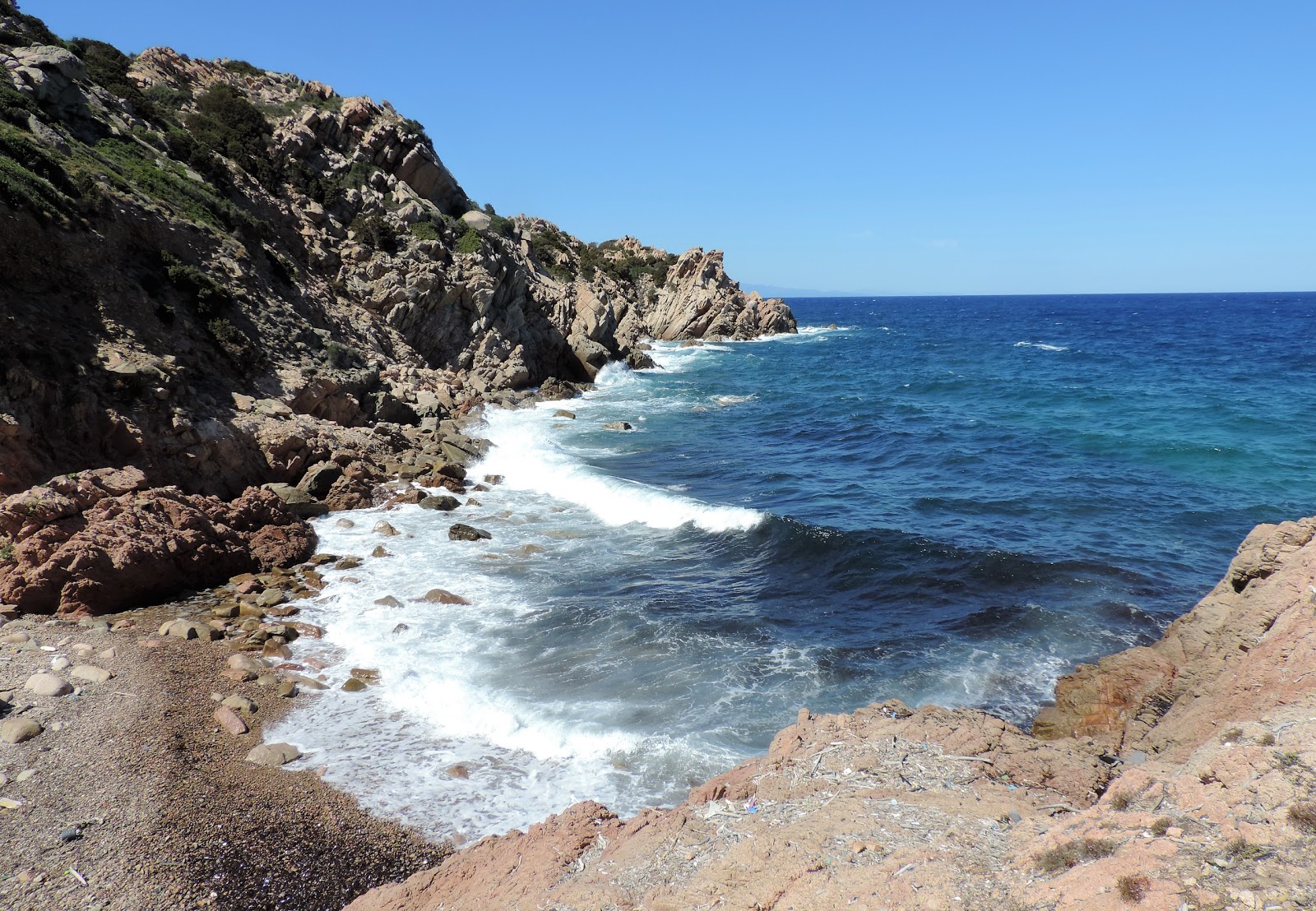 Foto di Cormorant beach con una superficie del ciottolame