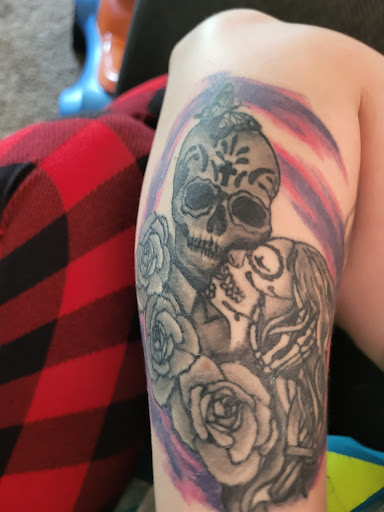 Explore funny couple tattoo ideas, creative tattoo ideas in Grandville, available at Wicked Ways Tattooing